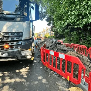 lorry next to stored soil